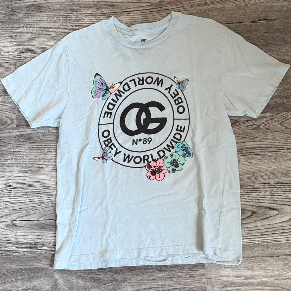 Obey Light Blue T-Shirt with Logo and Butterfly Accents